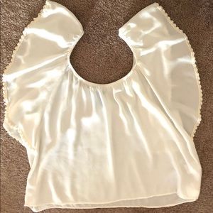 White top with flowy sleeves